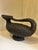 Vase made by Amilcare Rambelli in the 1960s, in black cold-painted terracotta. Its abstract shape bears the artist's...