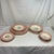 Elevate your tablescape with a classic touch of 1950s Americana. This 25-piece vintage dinnerware collection from renowned...