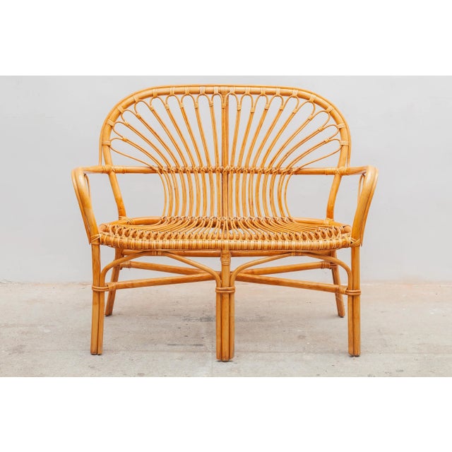Vintage mid-century boho set of bamboo wicker two seater in excellent condition with coffee table in bamboo and glass top....