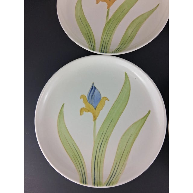 Add a touch of elegant vintage charm to your table with this lovely set of 8 salad plates from the sought-after Iris...