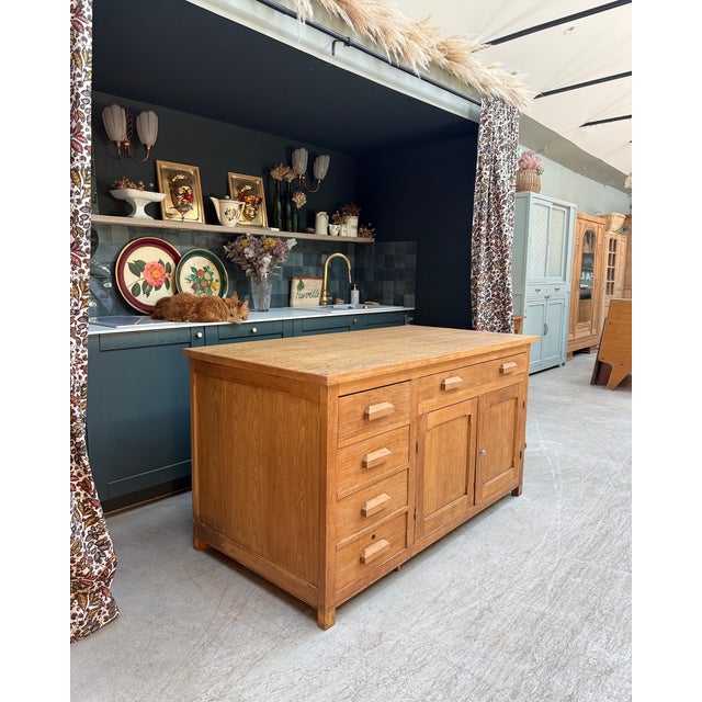 This oak cabinet, crafted by a cabinetmaker in the 1950s for his own use, combines robust craftsmanship with modernist...
