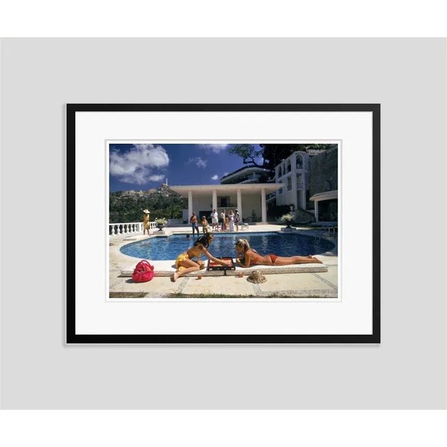 The Fullers' by Slim Aarons Open Edition Guests at the Villa Nirvana, owned by Oscar Obregon, in Las Brisas, Acapulco,...