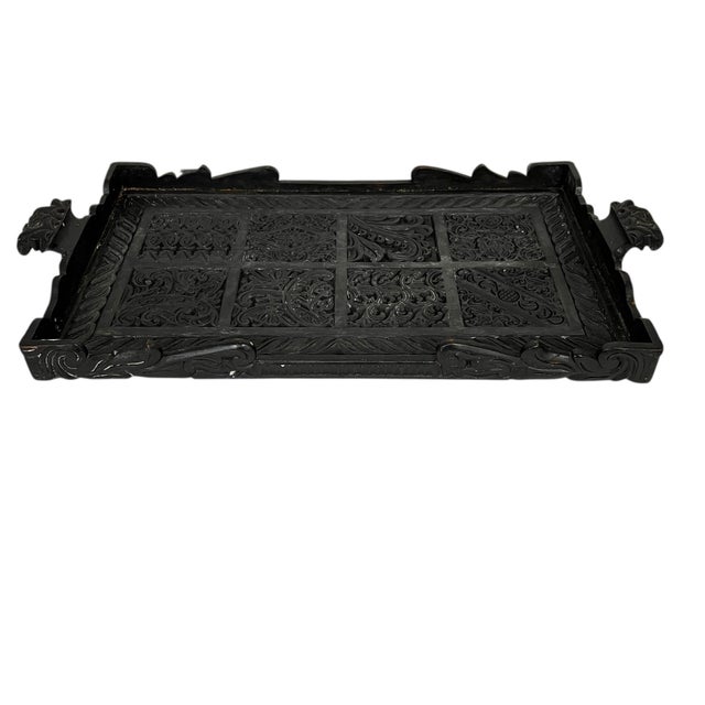 Vintage mahogany decorative carved tray. Lovely design with eight carved square patterns each with its own unique pattern....