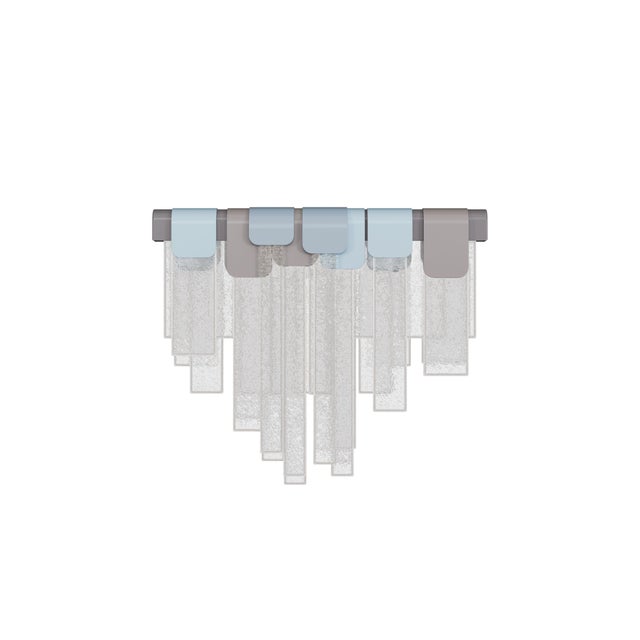 Inspired by the crystalline winter landscapes of Yosemite National Park, the Frostlight Wall Lamp captures the quiet...