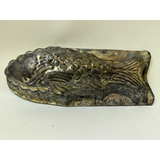 This exceptional antique tinned steel fish mold is a premier piece of American kitchenalia manufactured by A. Kreamer Inc....