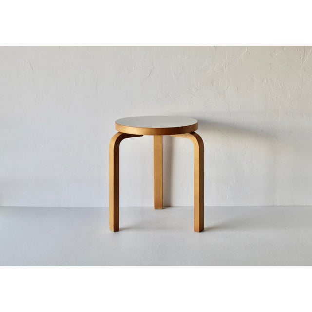 Fabulous Finnish classic by Alvar Aalto for Artek. Wood looks like birch, top is white. Designed in 1933, we think this...