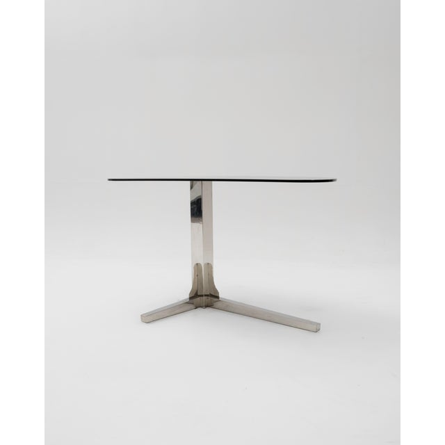 A desk or console table with fluid lines and a distinctly space-age aesthetic, this unique piece of furniture stands out...