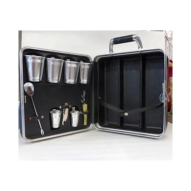 Great mid-century drinks case. Place for three bottles. Four small aluminium glasses 2.5 x 4, and two shot glass 1.5 x...