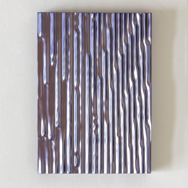 Three wall objects designed as a triptych by the German artist Willi Siber. The upright rectangular individual works are...