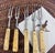 Late 19th Century Antique Primitive Two-Tine Forks With Bone-Style Handles - Set of 5 For Sale - Image 5 of 5