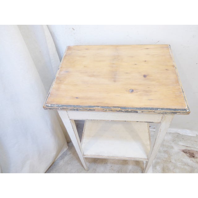 This weathered country nightstand measures 32'H x19"W x 15"D.