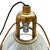 This industrial yet elegant hanging lamp from the 1940s features a Holophane glass shade. The pendant light is connected...
