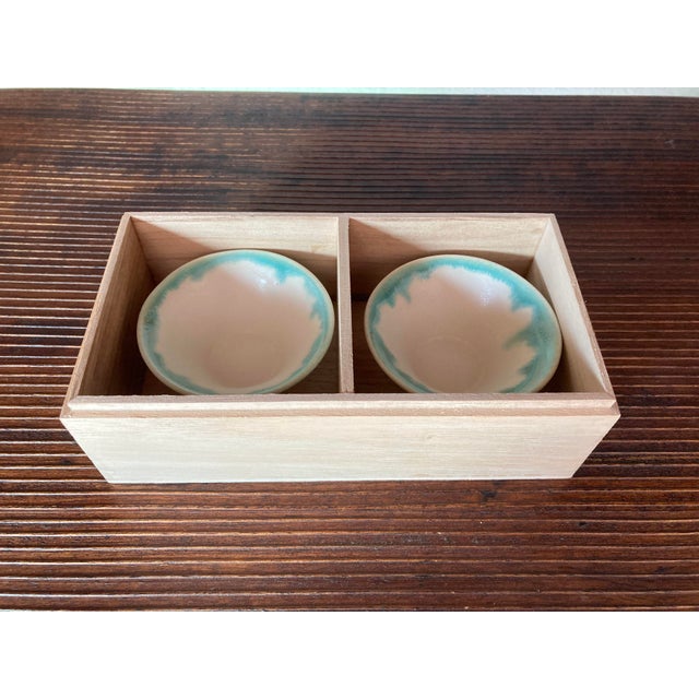 Bring a touch of Japanese craftsmanship to your table with this exquisite set of Mt. Fuji–inspired sake cups. This pair of...