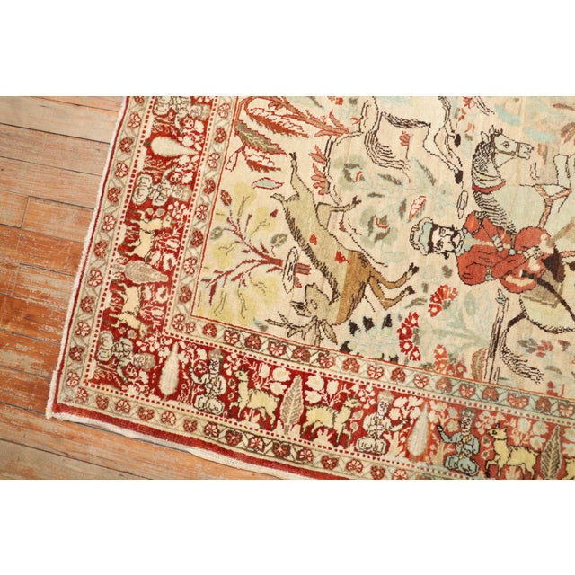 Scatter size antique Persian Tabriz rug with a Pictorial Animal Hunting Pattern from the 1st quarter of the 20th Century...