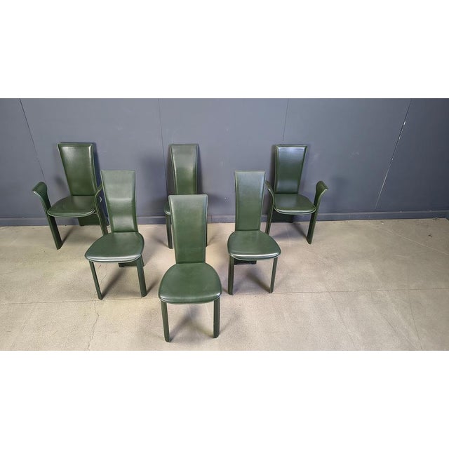 Very chic italian high back dining chairs designed by Pietro Costantini. Elegant curved chairs upholstered with green...