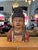 Late 19th-century carved wooden statue depicting the bust of Buddha. This Chinese sculptural work features a polychrome...