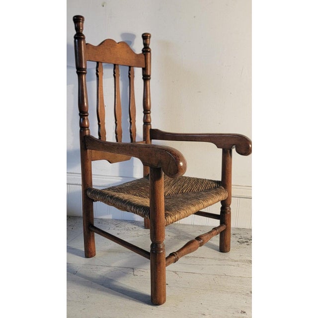 Early 19Thc Banister back child's chair with a original rush seat.The condition is very good and sturdy.This is a great...