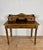 Elegant writing desk crafted in oak, featuring a refined raised gallery with two small drawers, an open central...