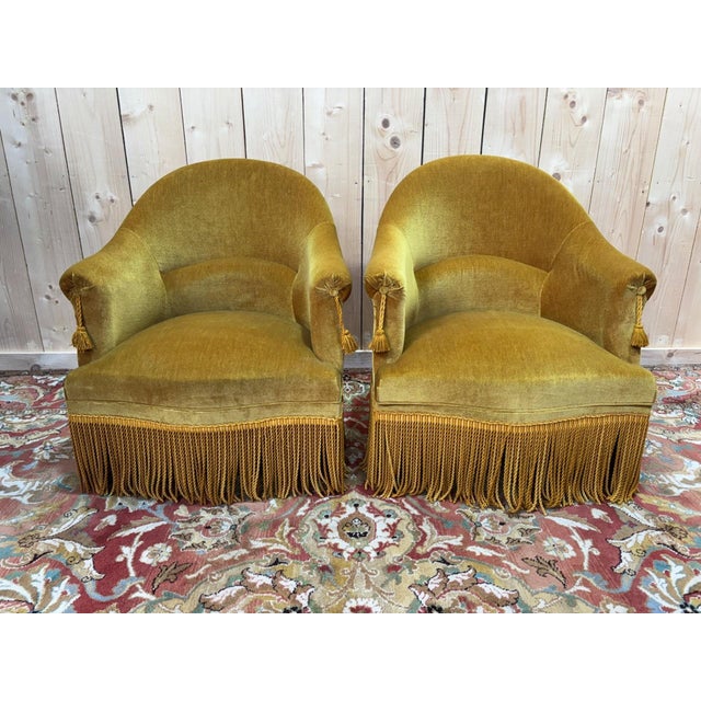 Magnificent pair of toadstool armchairs. Upholstered in sumptuous golden-yellow mohair velvet with subtle highlights,...