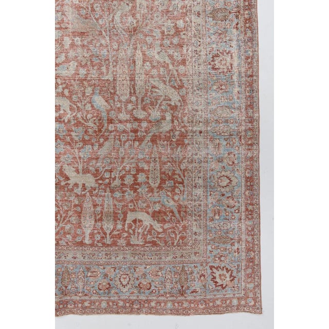 An early 20th Century Persian Animal Motif Pictorial Meshed Rug