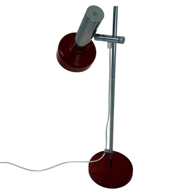 Burgundy red desk lamp / spot. Has been repainted and still has a small remainder of the original sticker on the bottom of...