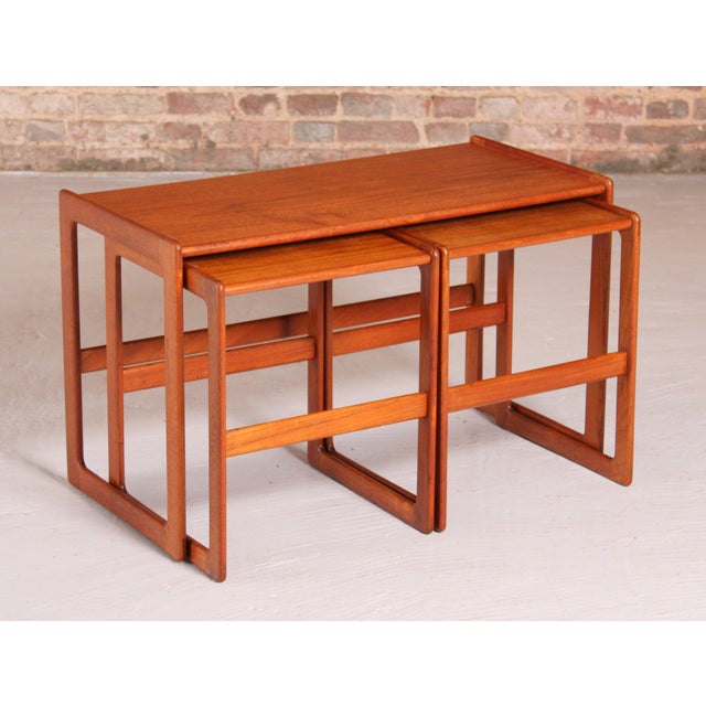 Danish Mid Century teak nest of tables by Arne Hovmand Olsen for Mogens Kold, circa 1960s. Excellent restored condition....