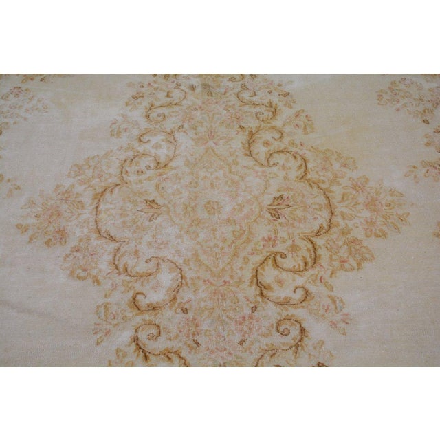 Hand-knotted with care using traditional rug-making techniques, this wool rug blends timeless craftsmanship with a modern...