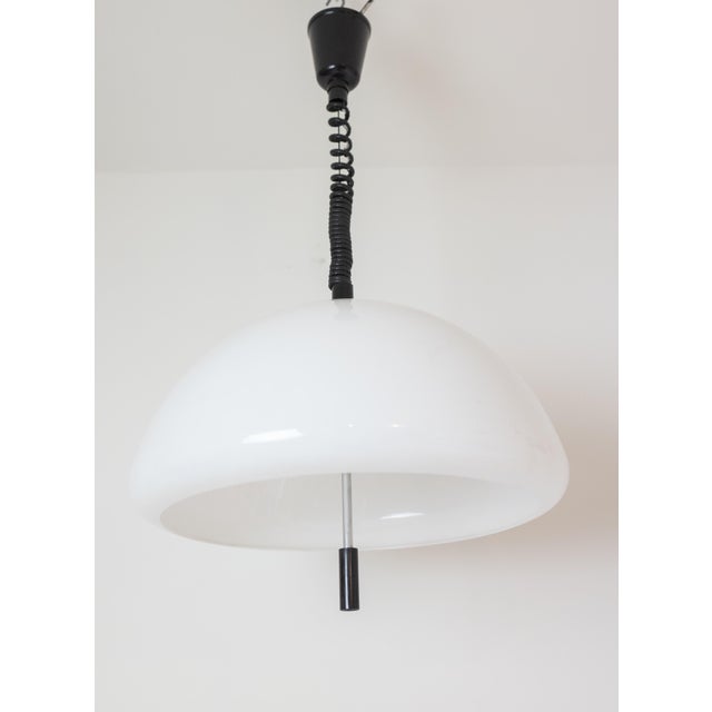 Large White Pendant Lamp by Guzzini, 1970s, in Flawless conditions. Designed 1970 to 1979 This piece is attributed to the...