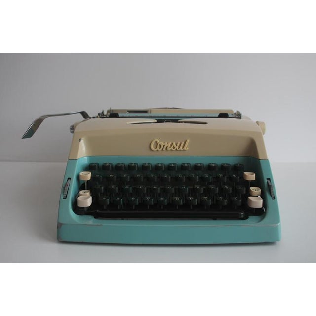 This eye-catching mid-century typewriter by Consul was produced in Czechoslovakia in the 1960s. It features a distinctive...