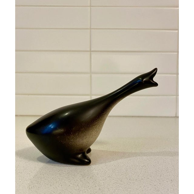 A dramatic trio of ceramic geese offer a multitude of arrangement options. Born in Chicago, Howard Pierce began his...