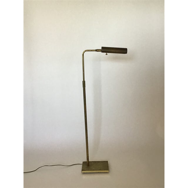 A beautiful example of classic design, this vintage brass reading lamp features a warm, richly tarnished finish that...