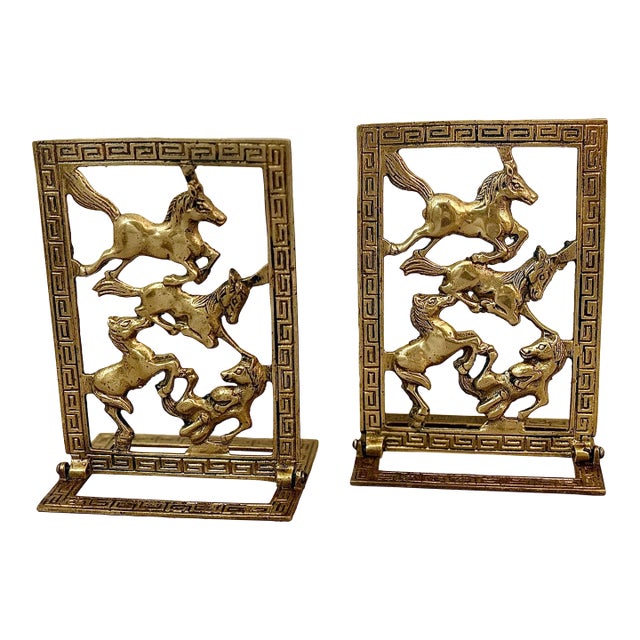 Vintage Chinoiserie Brass Horse Bookends With a Cut-Out Design of Galloping Horses Surrounded by a Greek Key Border-a Pair For Sale