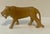 Detailed olive wood Lion sculpture from Kenya, by the Kamba tribe. The vintage carving measures about 5” tall x 8” long x 3”.