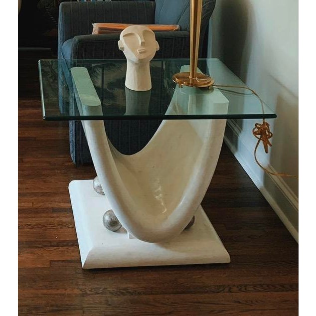 The base is a tessellated Mactan stone — a coral-derived material quarried in the Philippines and widely used in...