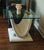 The base is a tessellated Mactan stone — a coral-derived material quarried in the Philippines and widely used in...