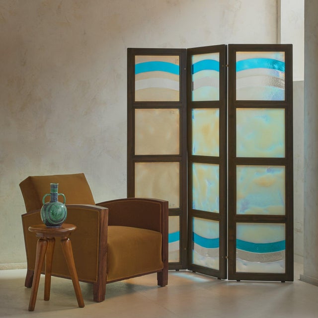 An Italian Murano glass screen or room divider by Leucos, crafted in the 1980s and handmade in Murano, the historic island...