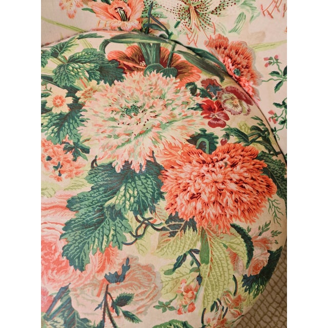 Greal little French Chair with swivel seat. Frame is painted in ivory and coral with matching floral chintz Upholstery....