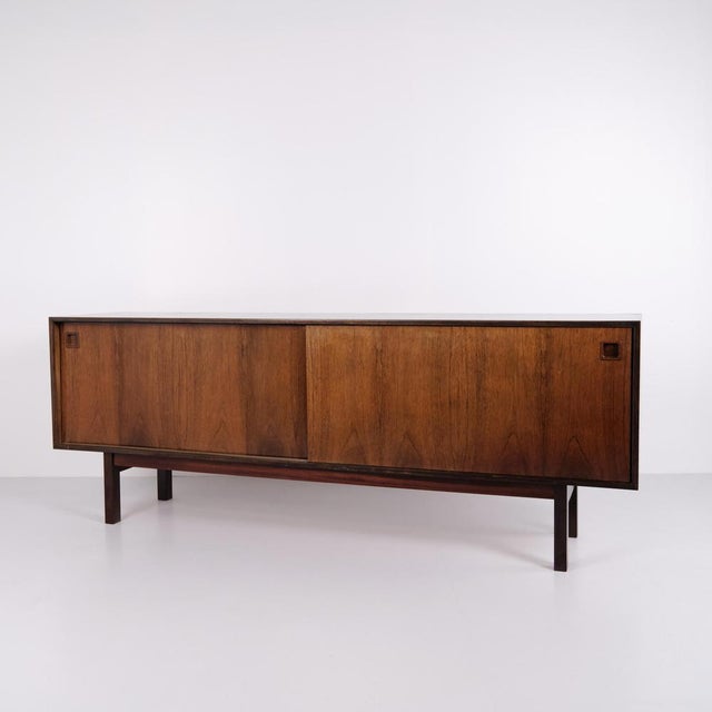 Omann jun model 21 sideboard by gunni omann in rosewood from the 1960s. designer: gunni omann model: 21 manufacturer:...