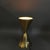 Italian vintage brass table lamp (circa 1960s), of a striking hourglass or "diabolo" silhouette formed from two joined...