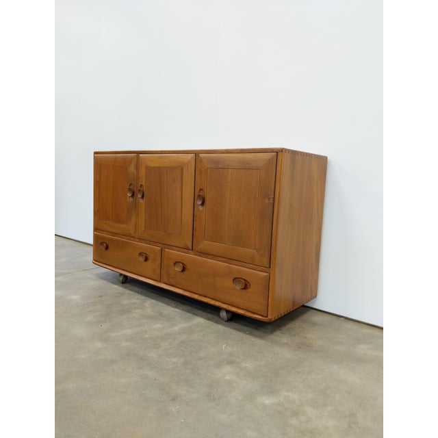 Authentic vintage mid century modern teak credenza / sideboard / console / cabinet. "Windsor" series by Ercol. Model 468...