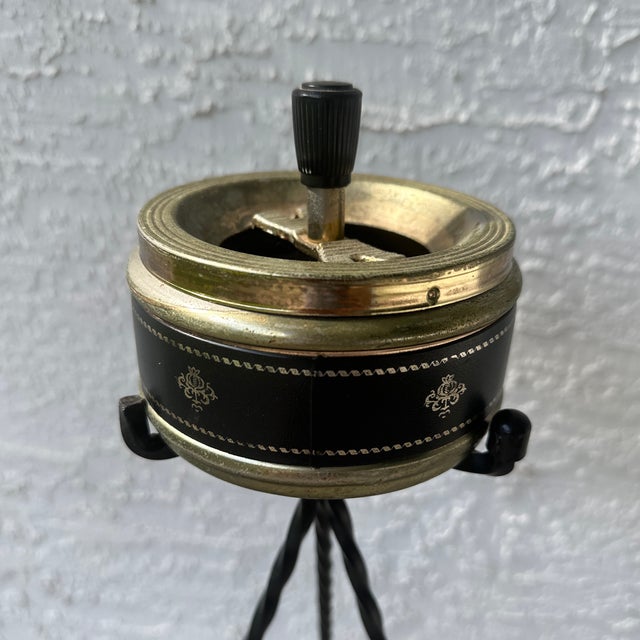 Discover a piece of French history with this charming vintage standing ashtray, complete with an integrated magazine or...