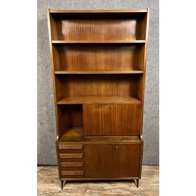 Italian secretary desk signed Mobili Barovero Torino, in exotic wood veneer, circa 1950-1960. An elegant and functional...