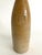 This antique German stoneware beer bottle has that organic element in its handmade imperfections and age earned patina....