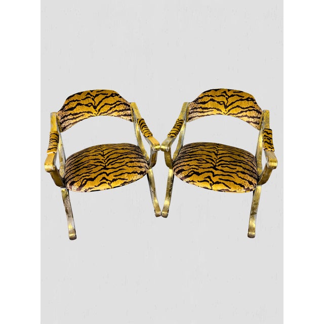Beautiful pair of Curule Form chairs. Newly reupholstered seat, back and arm pads in a Silk Tiger Velvet - Oro Fabric made...