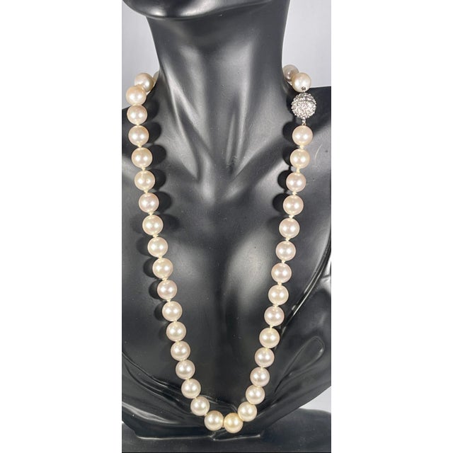 41 Round Akoya Pearls Strand Necklace Set in metal ball Clasp just look like diamonds it is a very nice pearl necklace. 18...