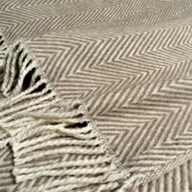 New from D.V. Kap, this 70% cotton/30% poly blend throw blanket is aesthetically refined, amazingly soft, and cuddly....