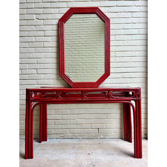 Introducing the Vintage Tony Duquette Style Newly Painted Red Split Reed and Rattan Glass Top Console, a stunning piece...
