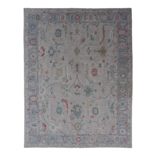 Large Modern Oushak With Floral Design on Light Blue Border With Pop of Colors For Sale
