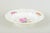 Royal Copenhagen Deep plate, early 20th century. Hand-painted porcelain with floral motif in multicoloured palette and an...
