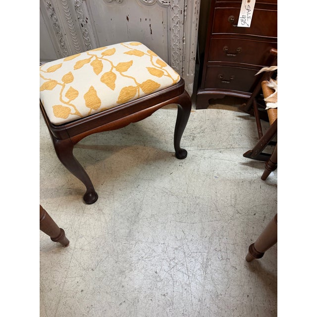 Wood Vintage Queen Anne Style Footstool Features Dark Wood Cabriole Legs With Pad Feet and an Off-White Cushion Upholstered in a Yellow Leaf Pattern For Sale - Image 7 of 8